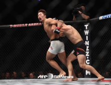 UFC 207 '벗어나려는 김동현과 잡으려는 사피딘'